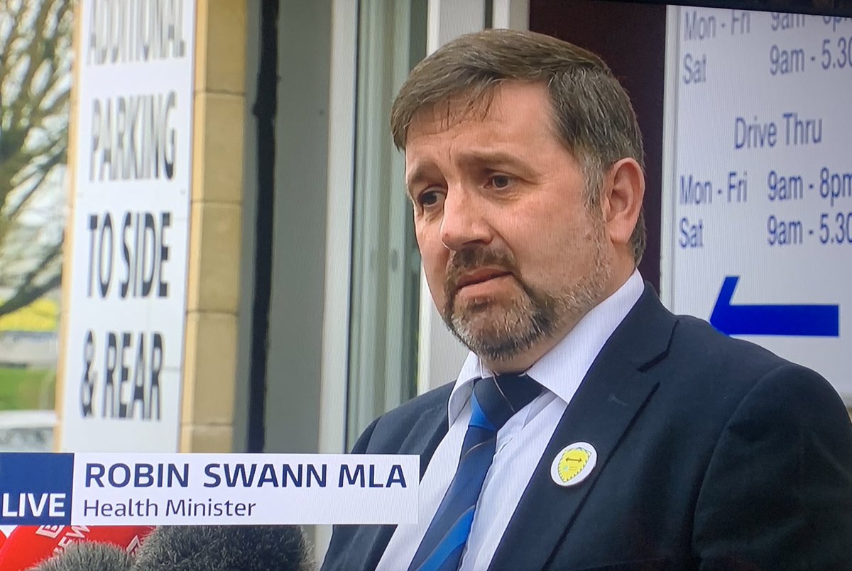 Brown_OConnor's tweet photo. Health Minister @RobinSwannMoH welcomed the new 45-49 age cohort  while receiving his vaccine at Ballee Pharmacy this afternoon. The Minister encouraged anyone eligible to book their appointment, with slots available at local community pharmacies. @compharmacyni https://t.co/StPGjfGeET
