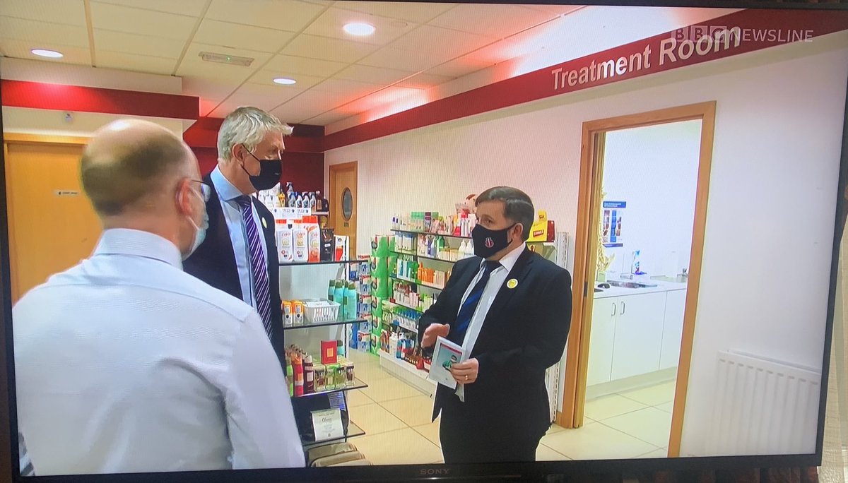 Brown_OConnor's tweet photo. Health Minister @RobinSwannMoH welcomed the new 45-49 age cohort  while receiving his vaccine at Ballee Pharmacy this afternoon. The Minister encouraged anyone eligible to book their appointment, with slots available at local community pharmacies. @compharmacyni https://t.co/StPGjfGeET