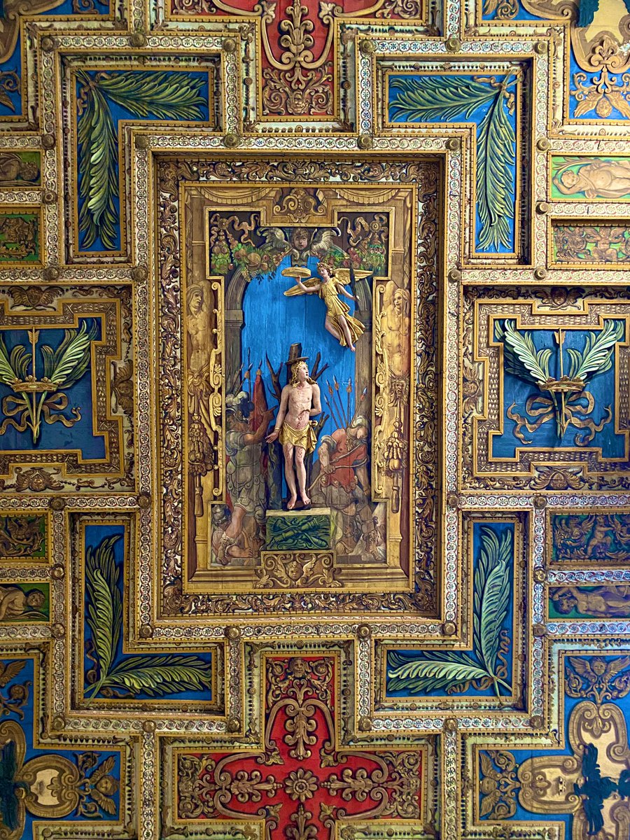 If its exterior is impressive, interior of San Sebastiano is breathtaking. The ornately decorated ceiling looms high above, featuring both a full sculptural scene of St. Sebastian and the coat of arms of the Borghese family, who funded its renovation in 1615. – bei  Catacombe di San Sebastiano