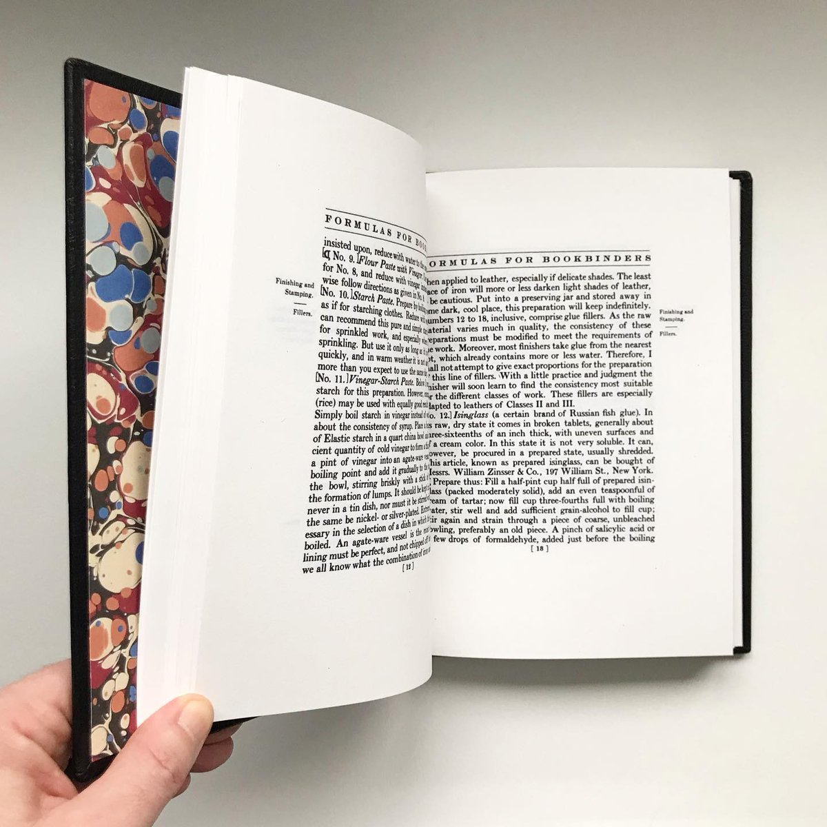 bailemorbooks's tweet photo. A peek inside this recently finished full leather binding of Formulas for Bookbinders. Flyleaf / doublure paper by @jemmalewismarbling.  #finebinding #leatherbound #bookcollecting #booklover #doublures #marbledpaper #handbookbinding #bibliophile #endleafpaper https://t.co/3HDXO20TxL