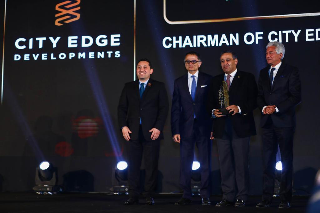 CityEdgeEg's tweet photo. In recognition of our ongoing commitment to excellence, #CityEdgeDevelopments was awarded “The most impacting national real estate developer in the Egyptian Economy and national Projects"  during  the #BT100 industries awards ceremony. https://t.co/oetYuUO7h8