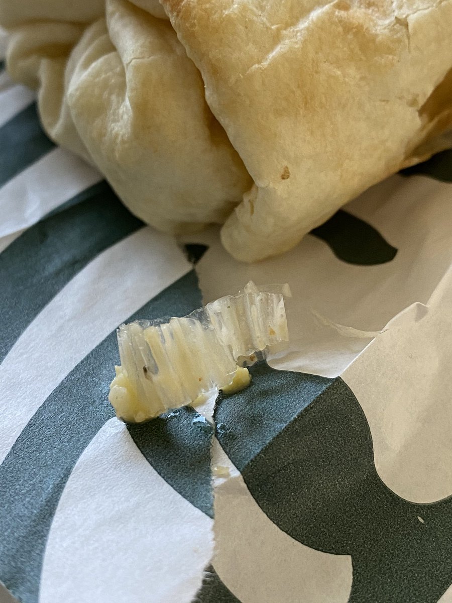 FilthyMoe's tweet image. Hi @Starbucks what is this is my bacon and sausage wrap? Kinda tastes like plastic