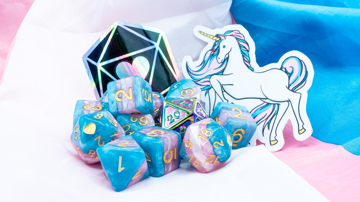 The flags at Castle Die Hard fly proudly in pink, blue, &amp; white in support of our transgender friends, family, team members, &amp; tablemates!

Celebrating #TransDayOfVisibility we're giving away <a href="/HeartBeatDice/">HeartBeat Dice</a> trans pride dice, Dire d20, &amp; matching sticker designed by Kynan!