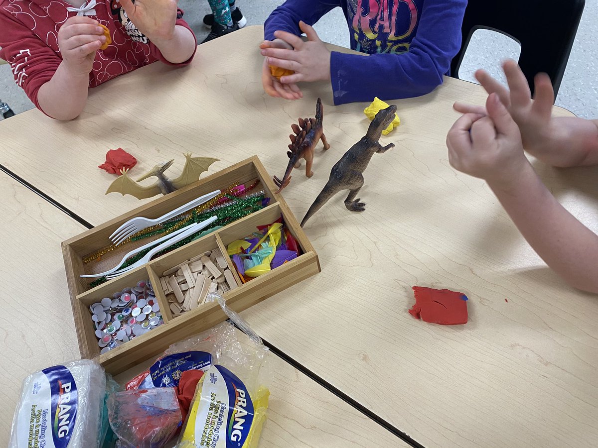 CThompson111809's tweet photo. To wrap up our #dinosaurinquiry, K students have been creating their own dinosaurs using clay and random art materials. Students pick one of our many figures to use as reference and try to match as many features as they can. @WPSTillsonburg https://t.co/AxQTRY00ai