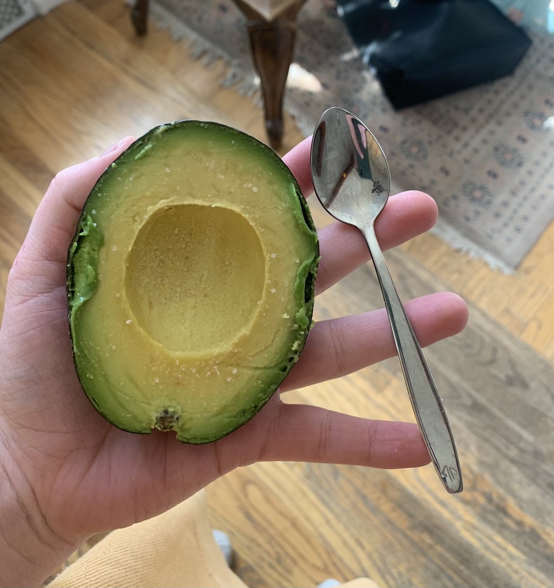 my comfort avocado and tiny spoon. it’s what gets me through on hard days </3 <3