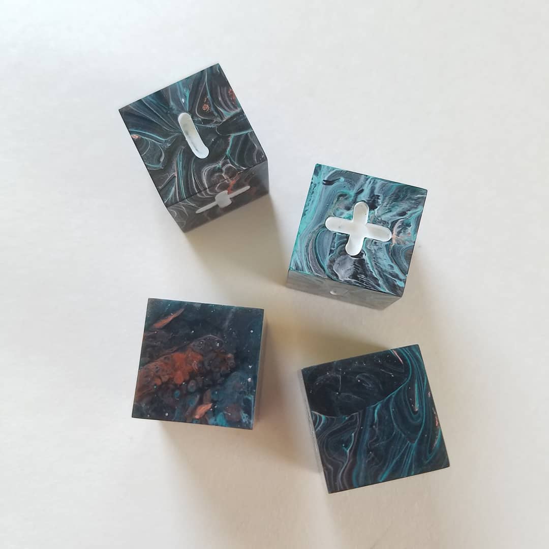 alchemist_attic's tweet photo. Getting ready for the shop restock on Friday! Gotta get photos of all the sets that will be available including these fate/fudge dice :) #handmadedice #fatedice #fudgedice #tabletopgaming #resinart https://t.co/5ULOkXTsQH