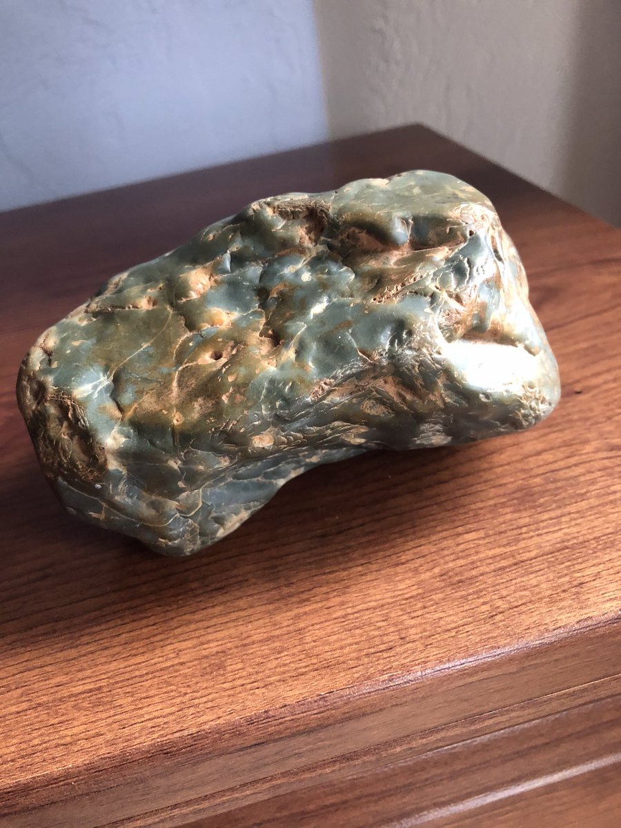 rspag's tweet photo. @NASAPersevere This is a photo of a rock I found in a river bed years ago. It looks very similar to the rock from Mars in this Tweet. My rock is glazed and rather heavy for its size. Same pock marks. Possible meteor? https://t.co/e7Vw64aEss