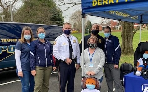 ChWarnerDTPD's tweet photo. Sgt Cotten (trying to hide) was with folks from @PennStHershey and @miltonhershey checking car seats and handing out brand new seats to those in need at the @cocoapacks event today.  #CommunityEngagement #communitymatters #DTPD #CocoaPacks https://t.co/yVp3iBwnH5