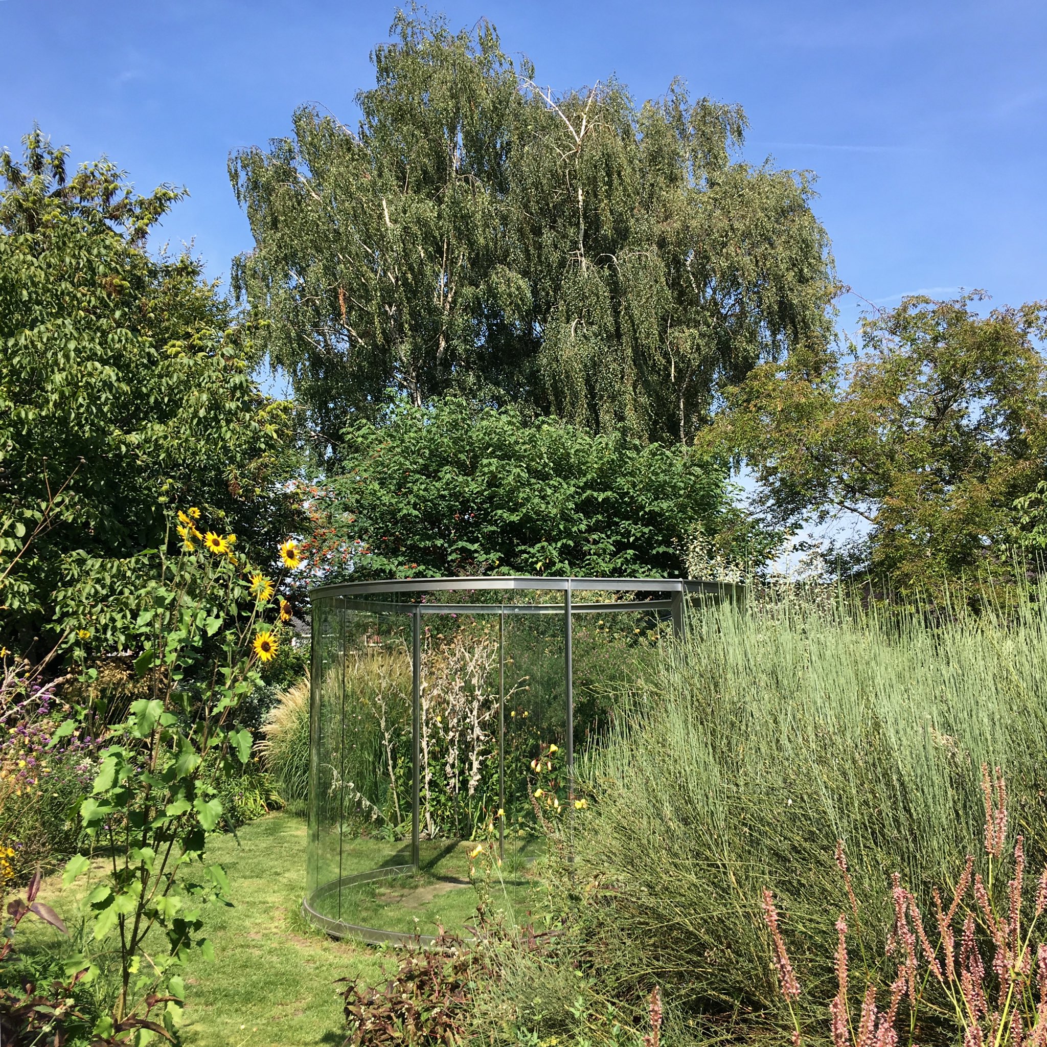 Happy Birthday Dan Graham  Dan Graham, Sculpture or Pavilion?, 2015, in the garden of August 2019. 