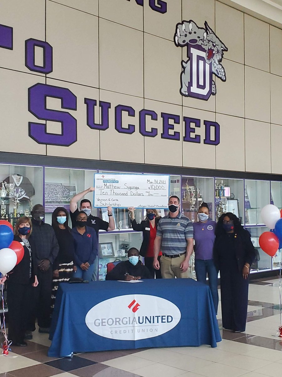 GAUnitedCU's tweet photo. You may not be able to see it but it was all smiles at @DHSGAWildcats today as Georgia United Foundation presented a $10,000 check to Mathew Sigunga! He is the recipient of the Vernon E. Carne Scholarship and he plans to study Engineering. Congratulations, Mathew!! https://t.co/Itc8v56MGK
