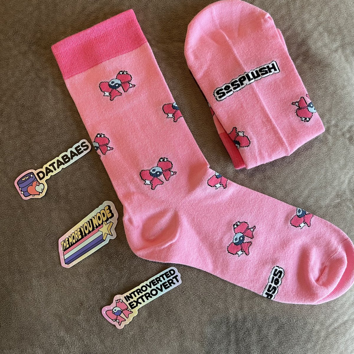 tekgy's tweet photo. OMG ๐คฉ look at these cute socks & stickers! Thanks so much @SoSplush! #databaes #theMoreYouNode #IntrovertedExtrovert https://t.co/AD9PllqQw5