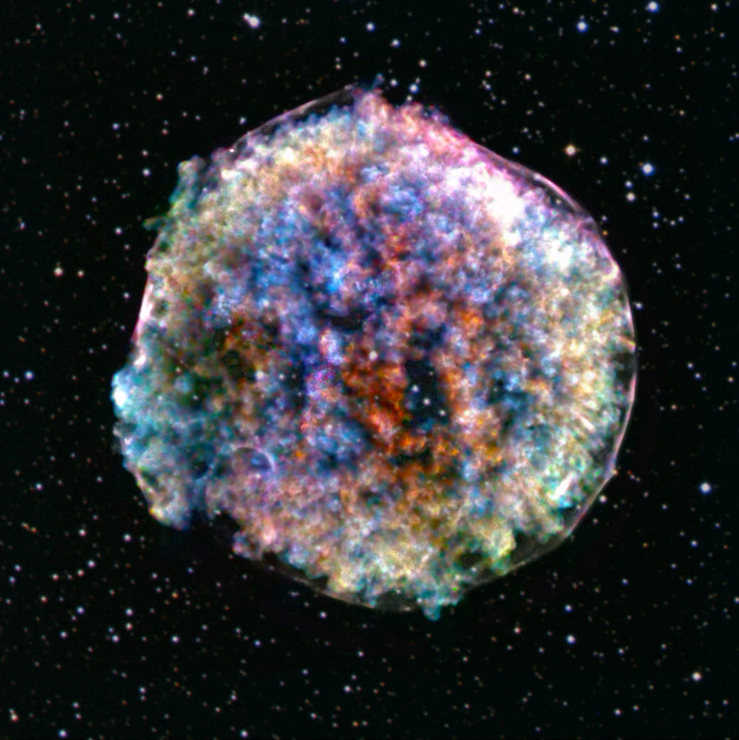 NASAJPL's tweet photo. Over-easy like Sunday morning.🐣
The Tycho supernova captured by @chandraxray is egg-cellent inspo for this weekend. The beautiful array of colors in this composite image are used to emphasize the clumps and three-dimensional nature of the large explosion. https://t.co/R92yyt7sLt https://t.co/KQodzl4cJi