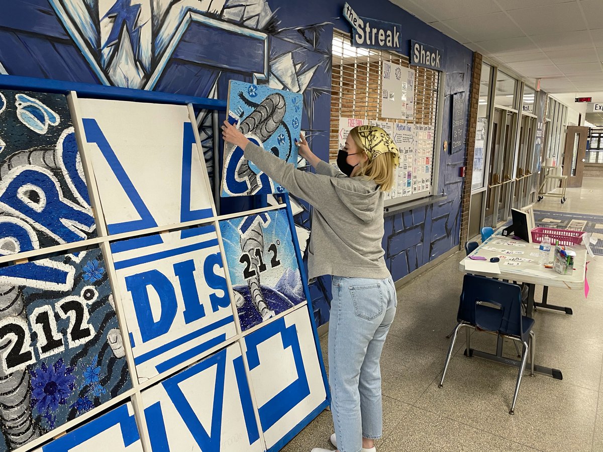 StreaksYearbook's tweet photo. More Mural Movement! Captains Kalissa Cherkes and Olivia Williams took the honors to flip two more tiles on the #ProjectUnify mural. One more day to get the rest! Turn in those Staff Coins! #wearemadisonblue https://t.co/Mwk2DPQBAn