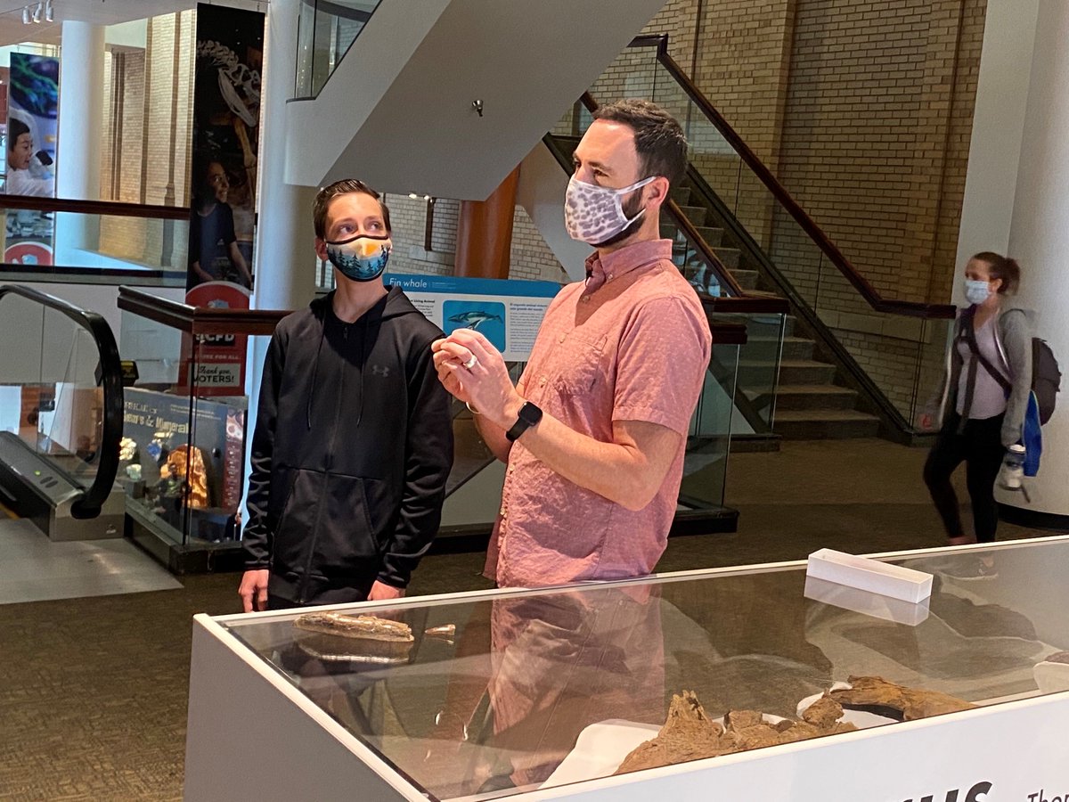 DenverMuseumNS's tweet photo. Is that a dinosaur tooth? Yep! A local 8th-grader, Jonathan Charpentier, found a T. rex tooth recently while walking outside. Today he met with curator Dr. Joe Sertich to share his discovery &amp; learn more. Thanks for your important find, Jonathan! #Dinosaur #Trex #Tyrannosaurusrex https://t.co/fOYnFpyYIK