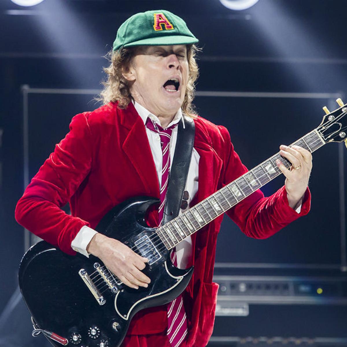 Happy 66th birthday to schoolboy Angus Young! 