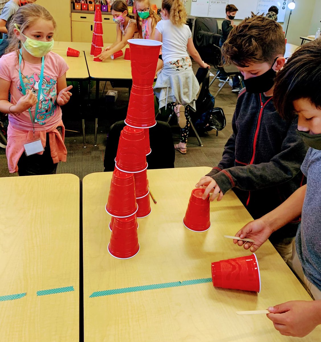 damiani_ms's tweet photo. Mrs. Panagakis’s 3rd graders were able to demonstrate how to Synergize! “Together is Better” with our team building stacking cup activity. Students needed to build a tower without touching the cups with their hands, and only use popsicle sticks to pick up the cups. #STEAM https://t.co/zRS2FWzLwM
