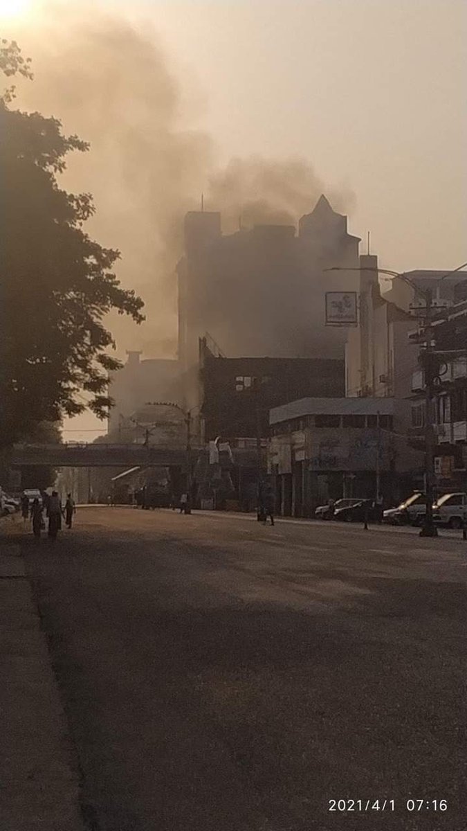 ChoZinLatt6's tweet photo. Myanmar military-owned businesses, Ruby Mart and Gandamar wholesale caught fire last night. Civilians who tried to kill the fire were also shot by military terrorists. A woman died on the spot reportedly.
SUPPORT FEDERAL ARMY 
#WhatsHappeningInMyanmar 
#Apr1Coup https://t.co/84yy2HHKpG