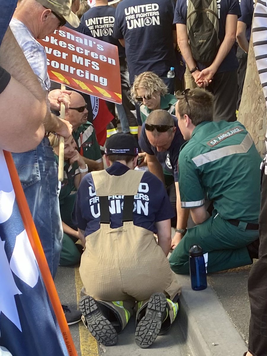 MsAbbie22's tweet photo. Paramedics and firies are never off duty. Even in the middle of their own rally, these first responders took time out to care for someone who had collapsed. 

Thank you for taking care of our community. We stand with you in your fight for better funding and equipment. 

#saparli https://t.co/0DQQSWUYA1