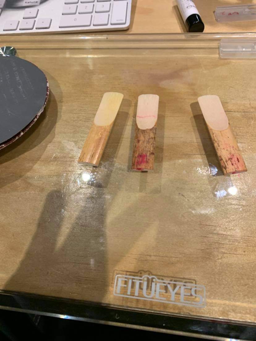 GarrettHack1's tweet photo. Having my student "marker" up some reeds for sanding and adjusting. The red line seen in the middle reed is for the fulcrum! @YEPeducation #Letsteachadults https://t.co/Z4LW7zzwYH