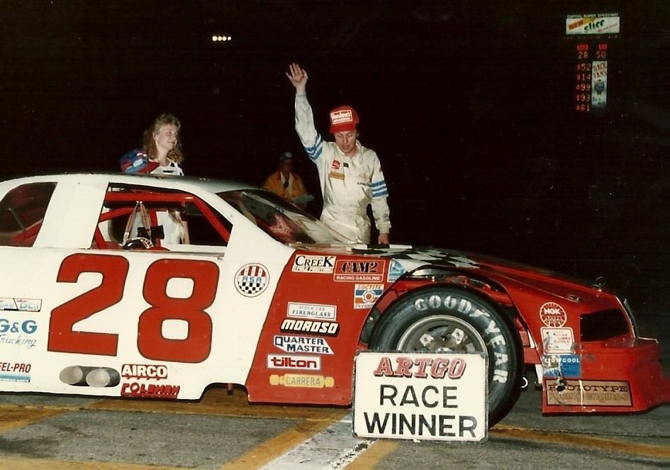 GreggMcKarns's tweet image. Alan Kulwicki winning @MISRacing (Capital) #ARTGO and him with a young fan (me) after winning the 1986 @nascar Rookie of the Year. #underbird