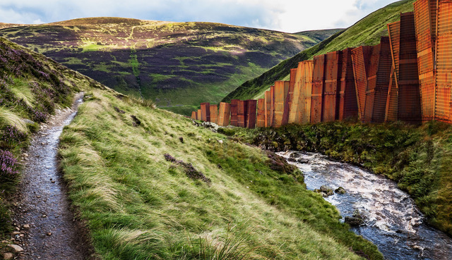 Artlyst's tweet photo. David Mach RA Unveils 100 Mile Scottish Border Wall Project  https://t.co/fqiSMP7l69 #davidmach #irncurtain https://t.co/HDgm2IB9oT