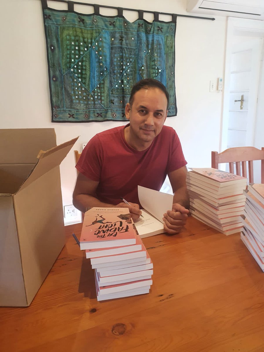 JacanaMedia's tweet photo. Hot off the press! Ashraf Kagee signing copies of his brand new novel #ByTheFadingLight! These copies will make their way to @readerwarehouse stores all over South Africa. https://t.co/3YKQ9P8RF5
