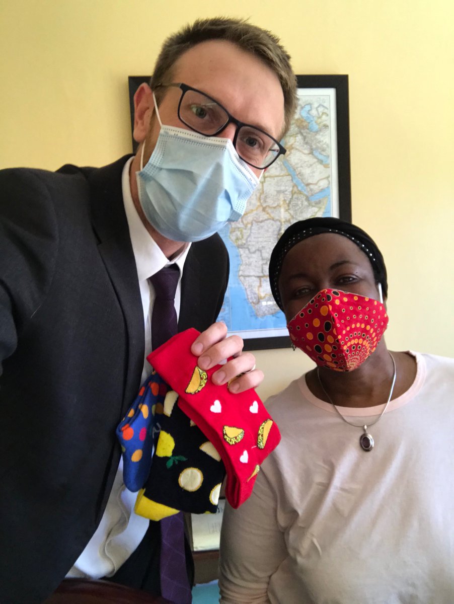 DougColtart's tweet photo. I was pleasantly surprised today to be paid a visit by a true legend and veteran of the struggle for a more just and equitable Zimbabwe, @EverjoiceWin, and to receive some more competition for @DouggiesYeloSox! 🧦 😂 Thank you for the socks, EJ, and for leading the way. https://t.co/9KQKpdllMn