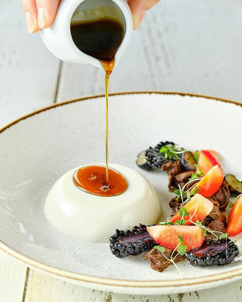 I do love a good “hands-in-the-frame-pouring-tasty-things” shot, and this beauty (dished up by the <a href="/dineindulge/">Dineindulge</a> team) really gets my mouth watering!
-
I’m so looking forward to getting back into some fine eating establishments over the coming weeks. Wish… instagr.am/p/CNHi02FjOt9/