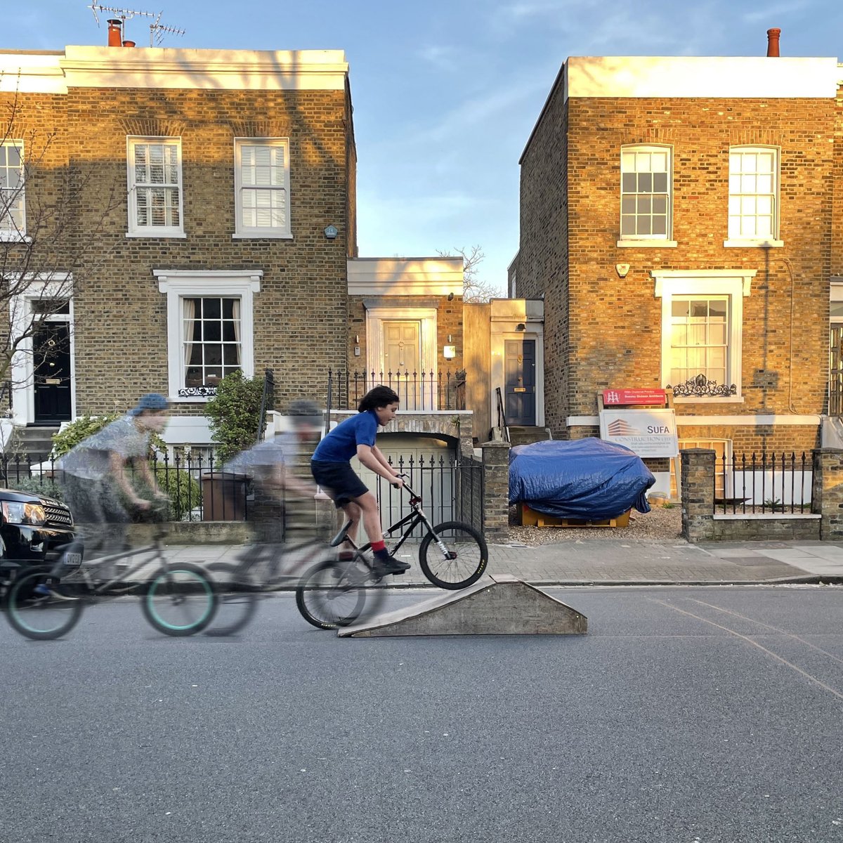 Sun's out, ramp's out. Local kids doing what they should be doing: hanging out in the street after school without fear of being driven at. Next to a filter in De Beauvoir, it's a safe space. <a href="/HackneyLivingSt/">Hackney Living Streets</a> <a href="/metecoban92/">Mete Coban MBE</a>  <a href="/hackney_cycling/">Hackney LCC</a> <a href="/PollyBillington/">Polly Billington</a>