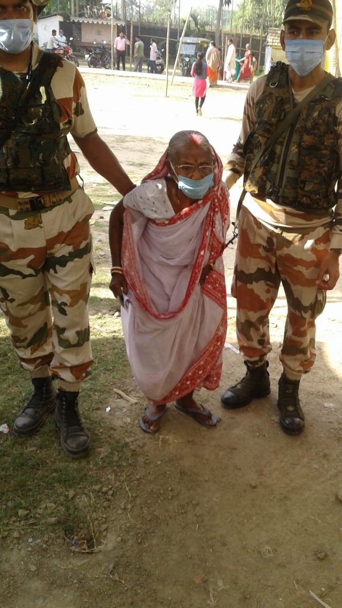 ANI's tweet photo. ITBP troops guard booths and help senior citizens in Tamluk, East Medinipur, during second phase of West Bengal Assembly polls: ITBP https://t.co/Q6w71d0tKq