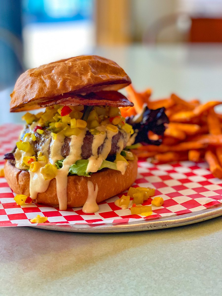 stackedstl's tweet photo. Spring is here and along with it our April burger of the month! Our 60/40 patty comes topped with pickled green tomato succotash, crispy pancetta, spring mix and drizzled with remoulade all on a brioche bun. And trust us, it tastes just as good as it looks! #delicious #April1st https://t.co/W0RPodol3e