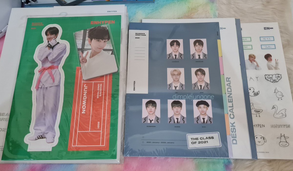 sg inclusions ☆(unsealed)- ot7 photocards- dvd - jungwon photostand - desk calendar- diary- sticker set
