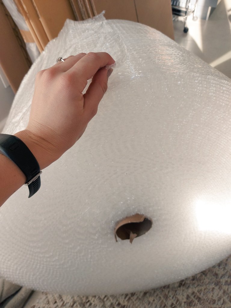 mjclements28's tweet photo. So I have a 100m of bubble wrap for packing this weekend...how do you suppose I stop myself from sitting with a glass of wine and popping this all night?! #helpme #thetemptationisreal #movingtotheUK https://t.co/yyKPN797xJ