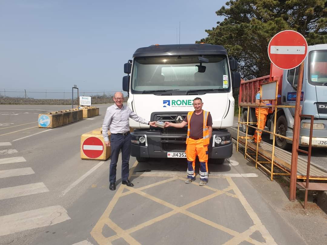 Ronez_Ltd's tweet photo. Congratulations to mixer driver Chris Ollivier on his retirement after over 30 years service with #ronez. Chris is pictured receiving a gift from Managing Director, Mike Osborne. https://t.co/7cvXUtbdFz