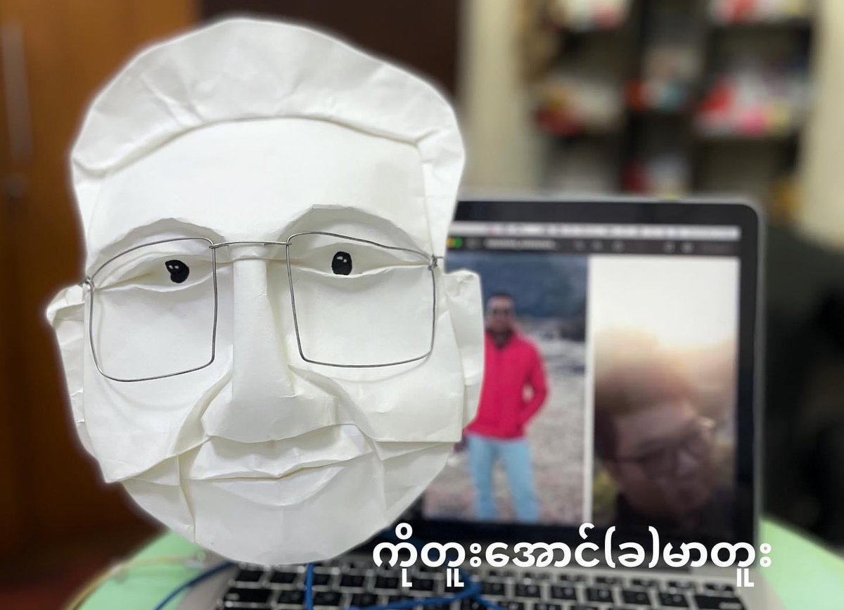 Shoon_Naing's tweet photo. An artist in Myanmar fold faces of “fallen heroes” as a tribute to their sacrifices. She has been working on these art works for days. More than 500 innocent civilians were killed by junta’s forces since coup. #WhatsHappeningInMyanmar https://t.co/6K2S1BN0I8