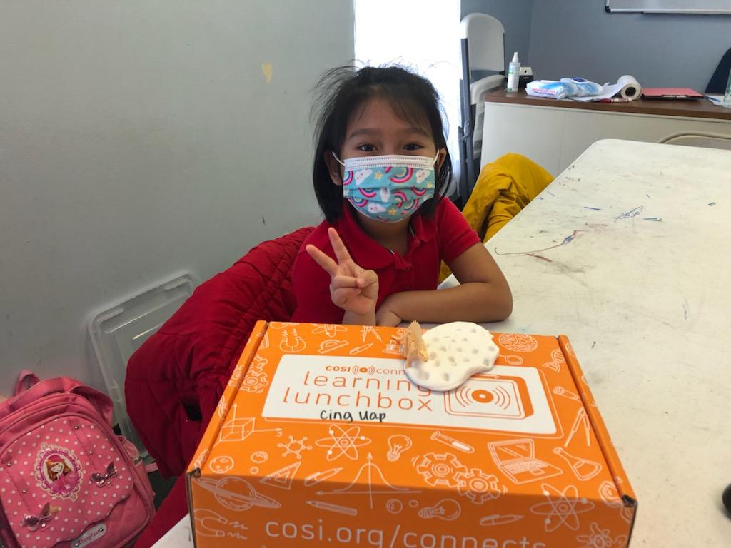 COSI's tweet photo. One of our biggest programs during the pandemic has been our #LearningLunchbox program. We partner with meal providers to help feed hungry lives and feed hungry minds. Weโve partnered with over 100 partners throughout 4 states to distribute these science kits. #IMLSMedals https://t.co/rkiqivmw4a
