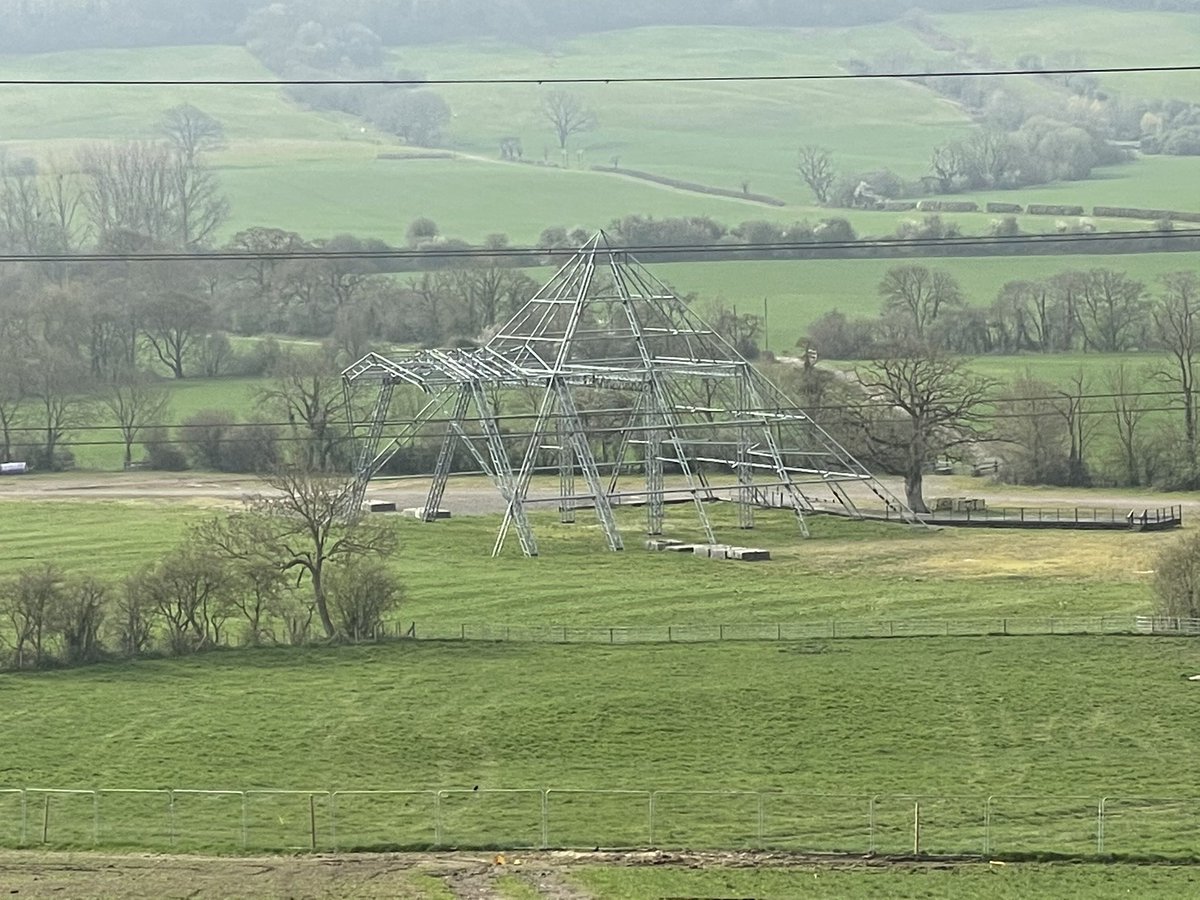 Butson12's tweet photo. Visiting the team at Worthy Farm @glastonbury today with their @KEENANsystem MechFiber 400! A familiar stage in the distance too! https://t.co/xLZj8Vtmp6