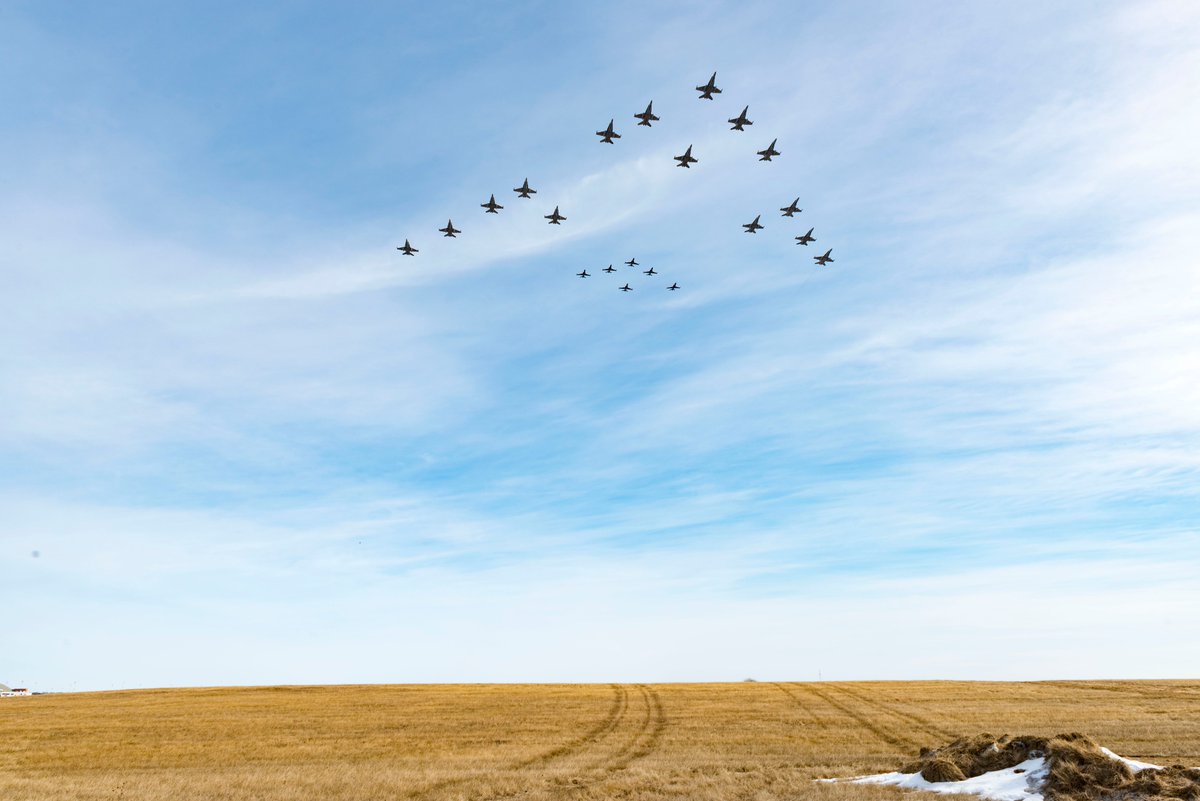 RCAF_ARC's tweet photo. 4 Wing Cold Lake conducted a large formation fly-past over the City of Cold Lake today, April 1. 15 CF-18 Hornets and 6 CT-155 Hawks flew in formation to celebrate the #RCAF's 97th Birthday. https://t.co/cZcdFmUFTf