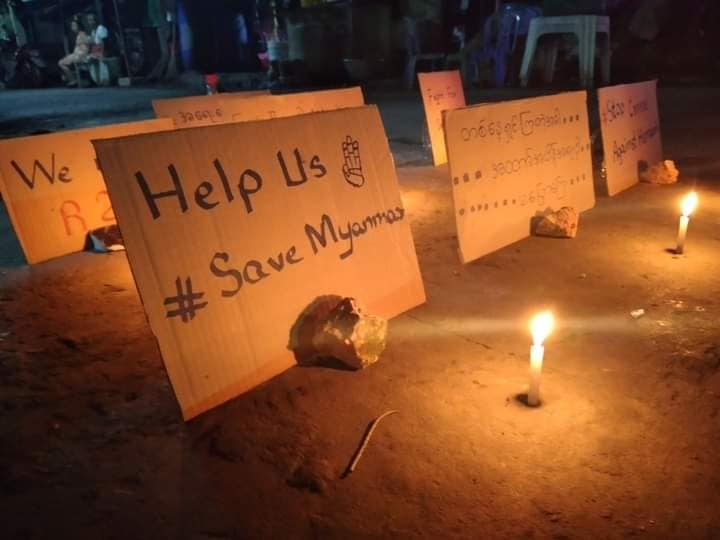 TostevinM's tweet photo. A few of the night protests in Myanmar against the military coup. In many places, copies of the 2008 constitution were burned. #WhatsHappeningInMyanmar https://t.co/oP6xd4okbz