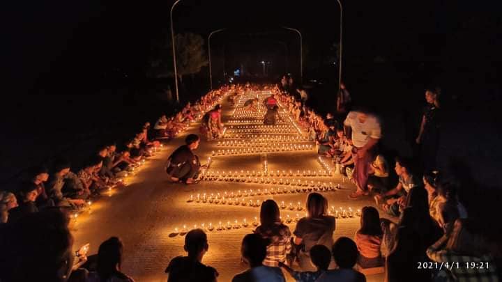 TostevinM's tweet photo. A few of the night protests in Myanmar against the military coup. In many places, copies of the 2008 constitution were burned. #WhatsHappeningInMyanmar https://t.co/oP6xd4okbz