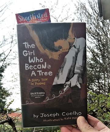 A library, books and a beautiful, emotional story told in poetry #thegirlwhobecameatree by @JosephACoelho One of the @CILIPCKG shortlisted books #InternationalChildrensBookDay #livolovesreading📚🌳
