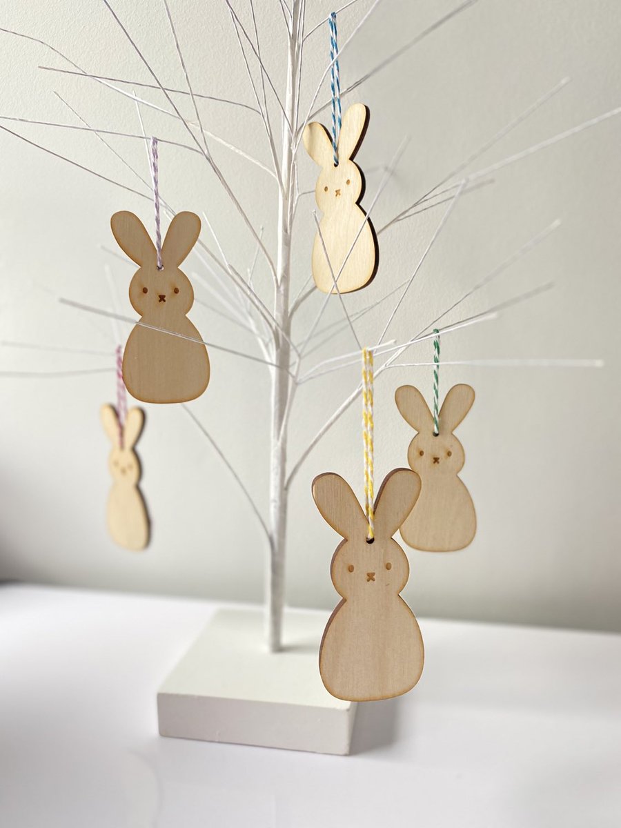 Excited to share this item from my #etsy shop: Plywood wooden hanging Easter bunnies with 100% wool felt Pom Pom little tail #bunnywithpompom #easterwoodgift etsy.me/3scyVf4