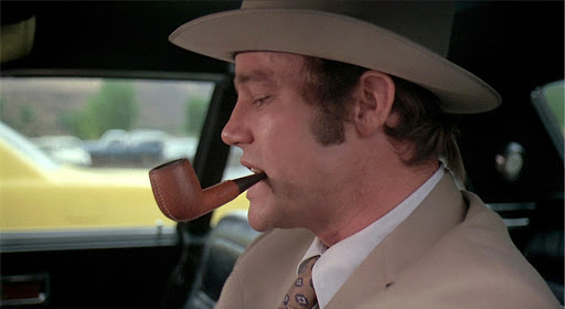 Joe Don Baker and his pipe. Charley Varrick. (Don Siegel, 1973)
