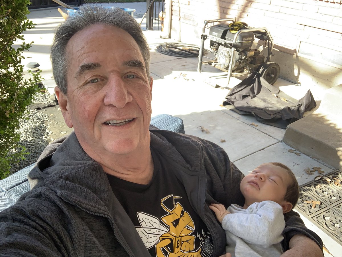 GaryLeland's tweet photo. A #cyberhornet on my chest and a future cyber honey in my arms.  Meet  my newest grandkid and future cyber hornet. https://t.co/6rqirHNSvV