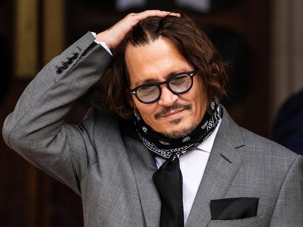 Cops arrest man taking shower at Johnny Depp's house