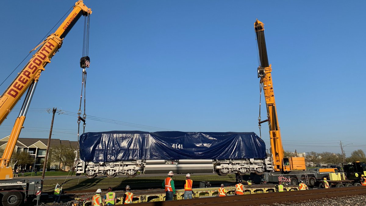 UnionPacific's tweet photo. #UP4141, The George H.W. Bush locomotive, returns to @TAMU for permanent display at the @Bush41Library, accompanied #UP1943, "The Spirit." Locomotive Engineer June Nobles and Conductor Randy Kuhaneck, who operated the funeral train, also handled this final move for #UP4141. https://t.co/z8Vcysy1Pe