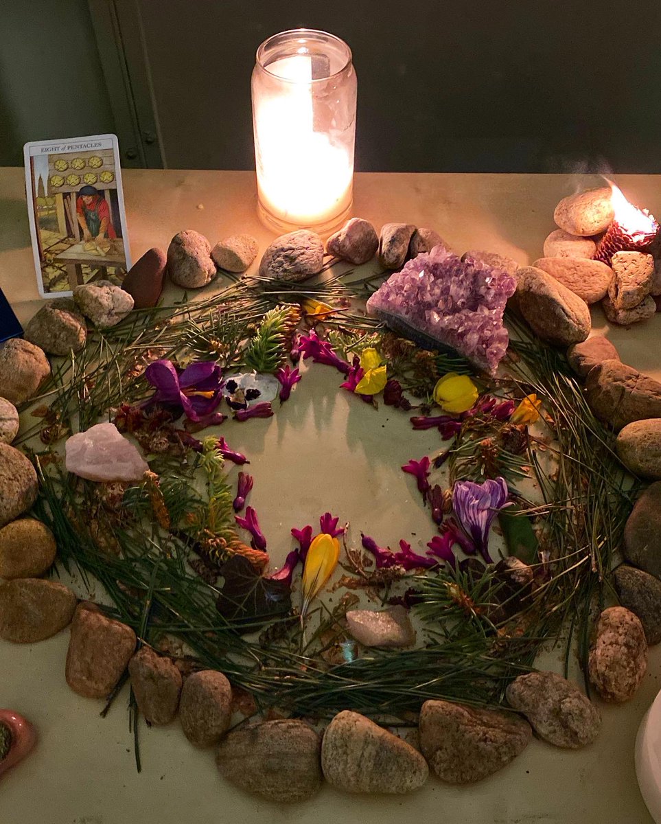 grispalomairis's tweet photo. My #Ostara altar, close up. 🕯Notice the 8 of Pentacles card 🪙 signaling to me abundant income and sharpening craft. 🌿 Purchase a reading at the link in bio for insight into this magical Spring season + checkout the new ✨Spring Sorcery Special✨ #SpringIsComing https://t.co/07SqCttsGP