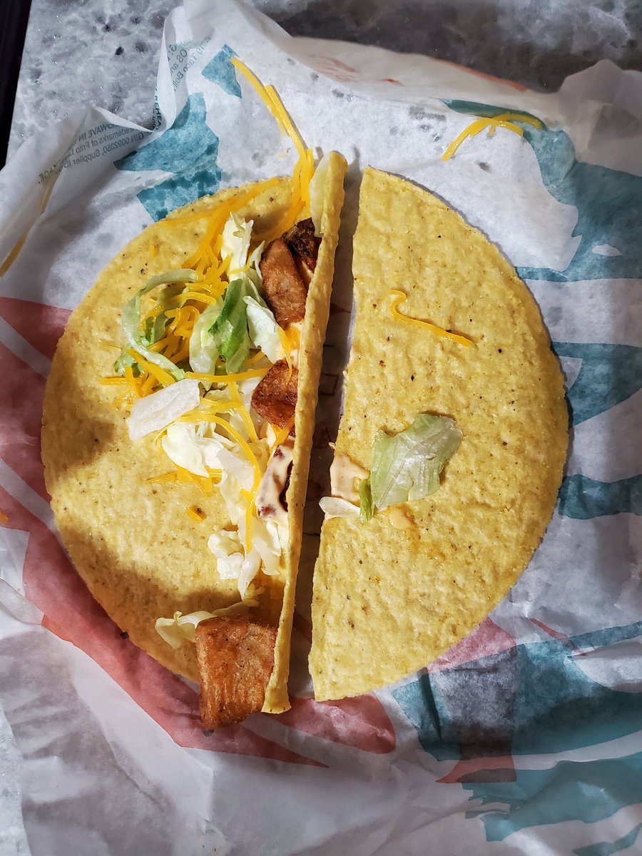 DBIZZ42's tweet photo. @tacobellcare taco bell was out of basically everything we wanted, including soft taco shells. I asked of they could do the spicy potato taco in a hard shell and this is was I got. https://t.co/1HzQYSmkvc