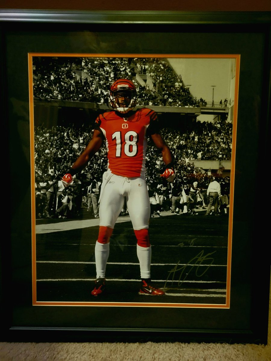 BengalsCaptain's tweet photo. Okay #Bengals fans, giveaway time. We lost a current legend, so I'm offering up this framed AJ Green piece. Originally won at an autographed memorabilia auction at a Cbus Blue Jackets game benefitting their chairty. 22.5" x 26.5". Retweet to enter, winner must be a follower. https://t.co/XVCHMZxAmg