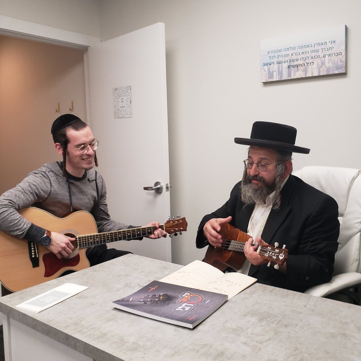 KinorMusic's tweet photo. What an honor! Today r' @motafrank1 came by &amp; was the first one to learn a song in the new #ukulele Book!!
The new #ukulele set will be in stores right after Pessach iy"h! https://t.co/InEigYvAcL
